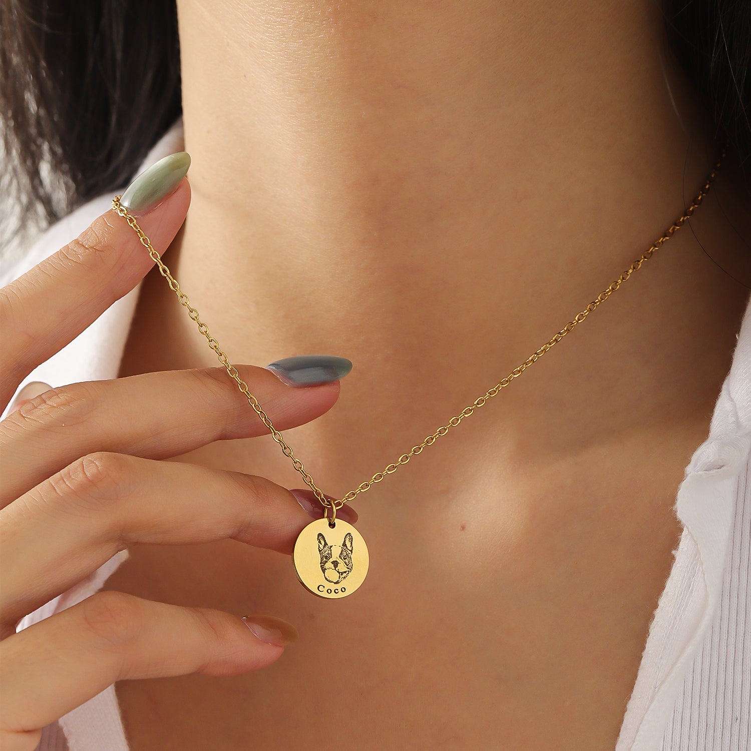 Woman wearing custom dog necklace personalized in gold